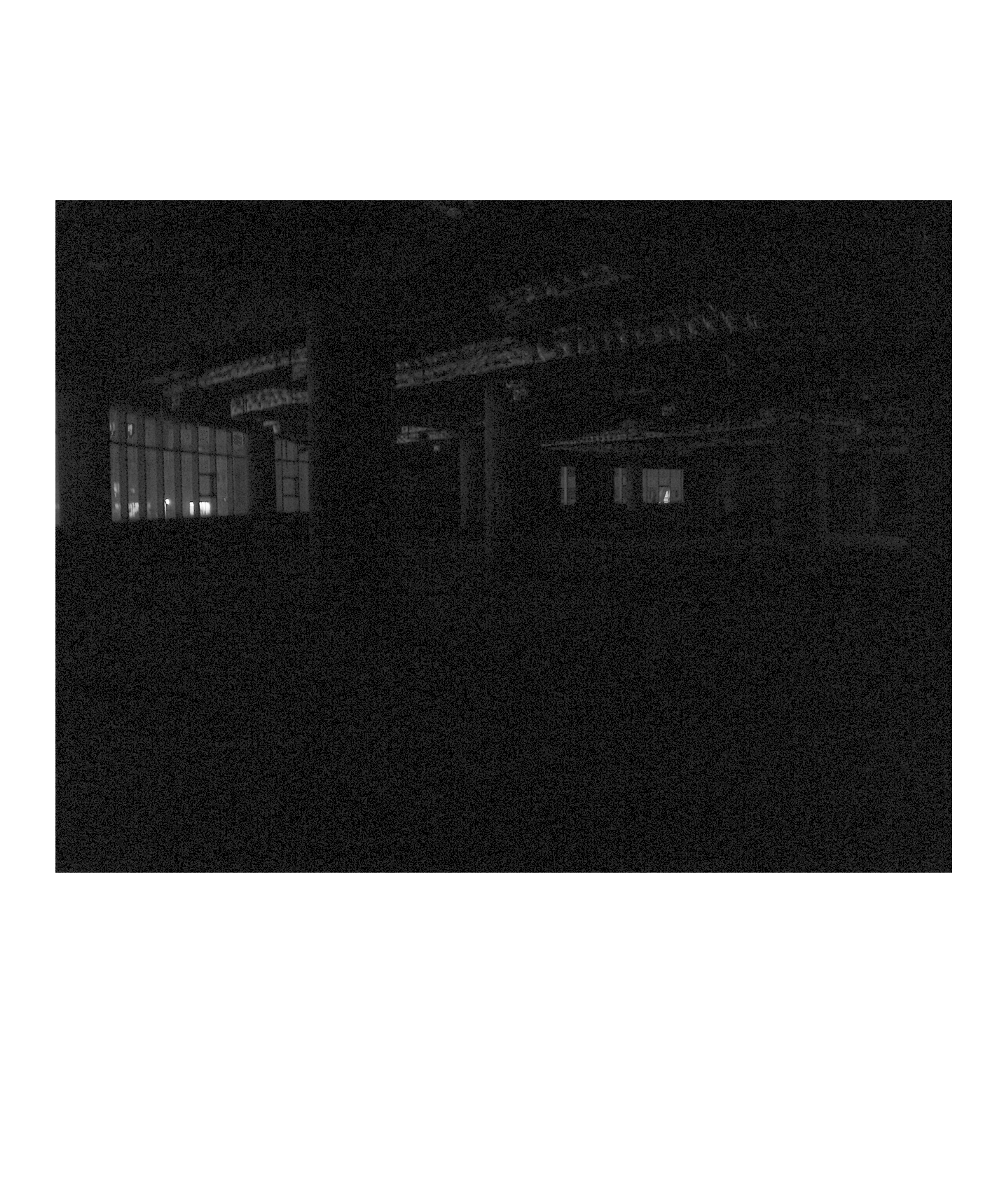 photograph of dark parkade